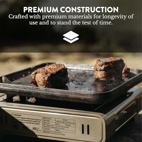 Steaks cooking on a portable grill with text promoting premium construction.